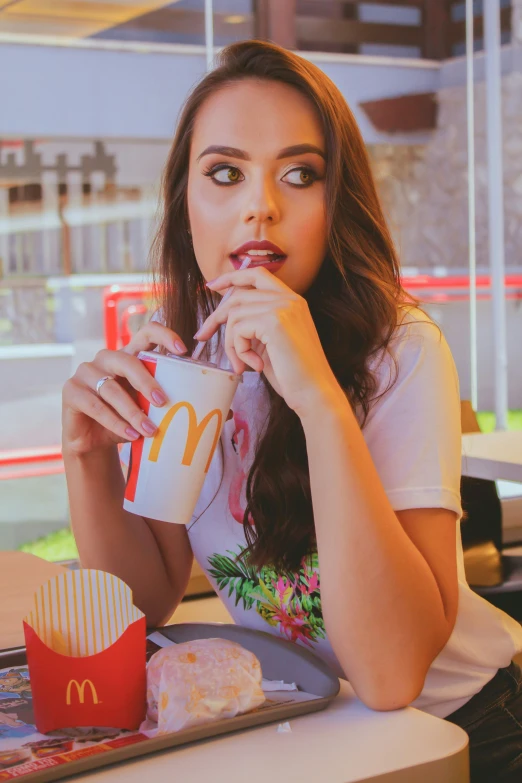 a woman sitting at a table in a fast food restaurant, pexels contest winner, photorealism, soft devil queen madison beer, square, 15081959 21121991 01012000 4k, kaya scodelario