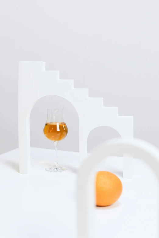 a glass of wine sitting on top of a table, an abstract sculpture, inspired by Évariste Vital Luminais, stairs and arches, all white render, beer, studio product shot