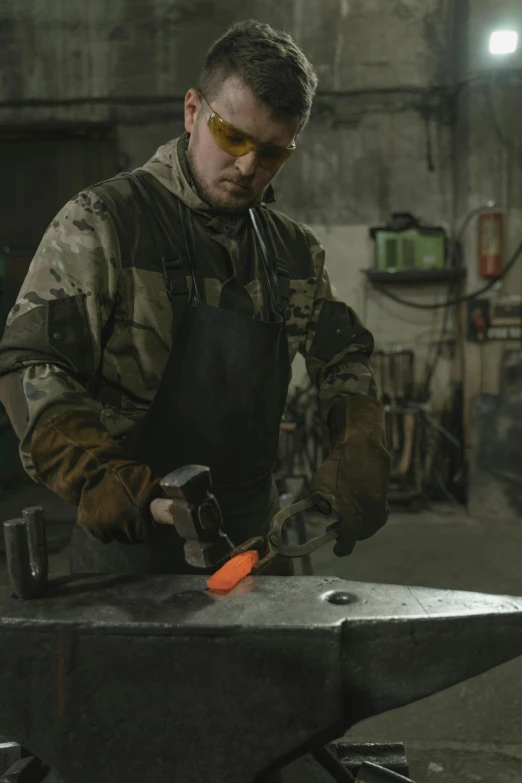 a man working with a hammer on an anvil, by Joe Stefanelli, arbeitsrat für kunst, steel plating, grey, commercial, brown