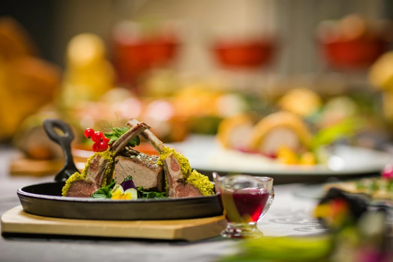 a close up of a plate of food on a table, by Adam Marczyński, holiday, gourmet, ready to eat, horned