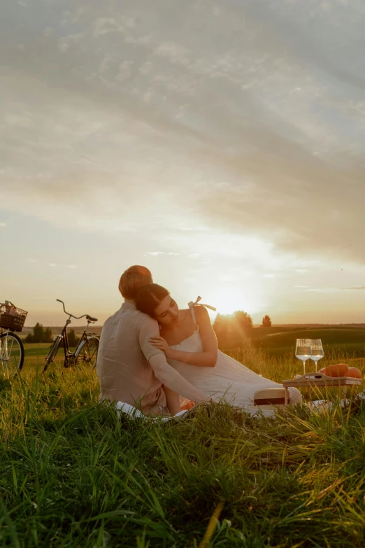 a couple of people that are sitting in the grass, pexels contest winner, romanticism, wine, sunlit sky, picnic, soft light