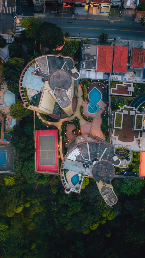 a bird's eye view of a house surrounded by trees, pexels contest winner, conceptual art, water park, kuala lumpur, tennis court, curvy build