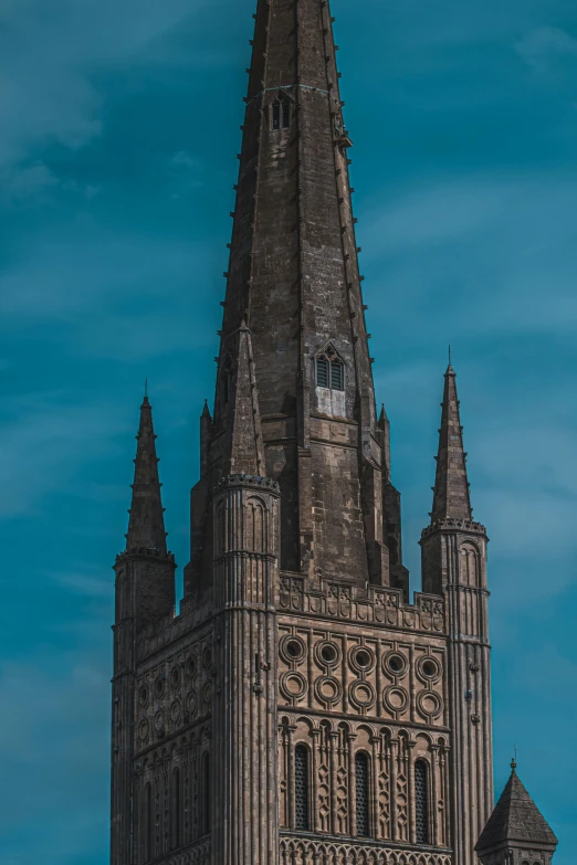 a tall tower with a clock on top of it, by Charles Uzzell-Edwards, majestic spires, devils horns, hull, color corrected