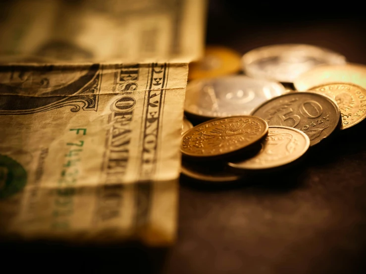 a pile of money sitting on top of a table, in the evening, a close-up, slide show, vintage vibe