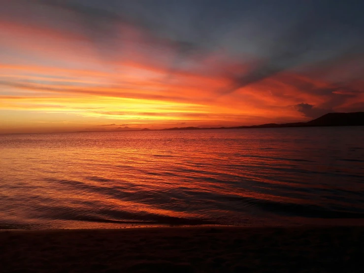 a sunset over a body of water, pexels contest winner, romanticism, orange and red lighting, abel tasman, fire on the horizon, youtube thumbnail