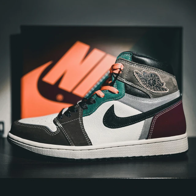 a pair of sneakers sitting on top of a table, inspired by Jordan Grimmer, hurufiyya, multi colored, well preserved, high quality product image”, color block