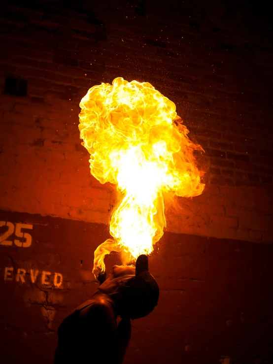 a person holding a fire up in the air, sfx, fireball hand, fully functional, 2 5 yo