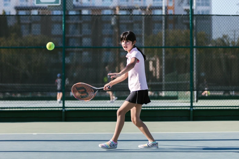 a young girl holding a tennis racquet on a tennis court, unsplash, american barbizon school, action shots, louise zhang, slightly pixelated, thumbnail