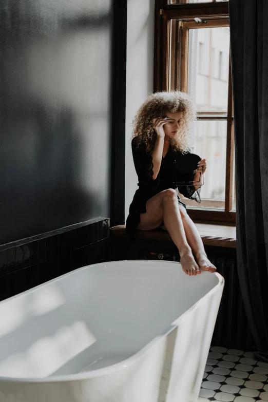 a woman sitting on a window sill next to a bathtub, trending on pexels, curly blonde hair | d & d, in a pitch black room, girl making a phone call, profile image