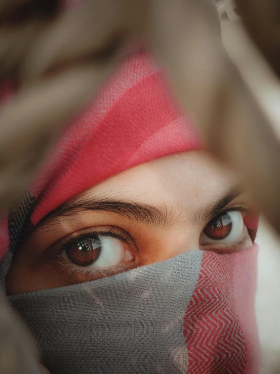 a close up of a person wearing a bandana, inspired by Steve McCurry, trending on unsplash, hurufiyya, big pink eyes, wearing translucent veils, spying discretly, arab princess