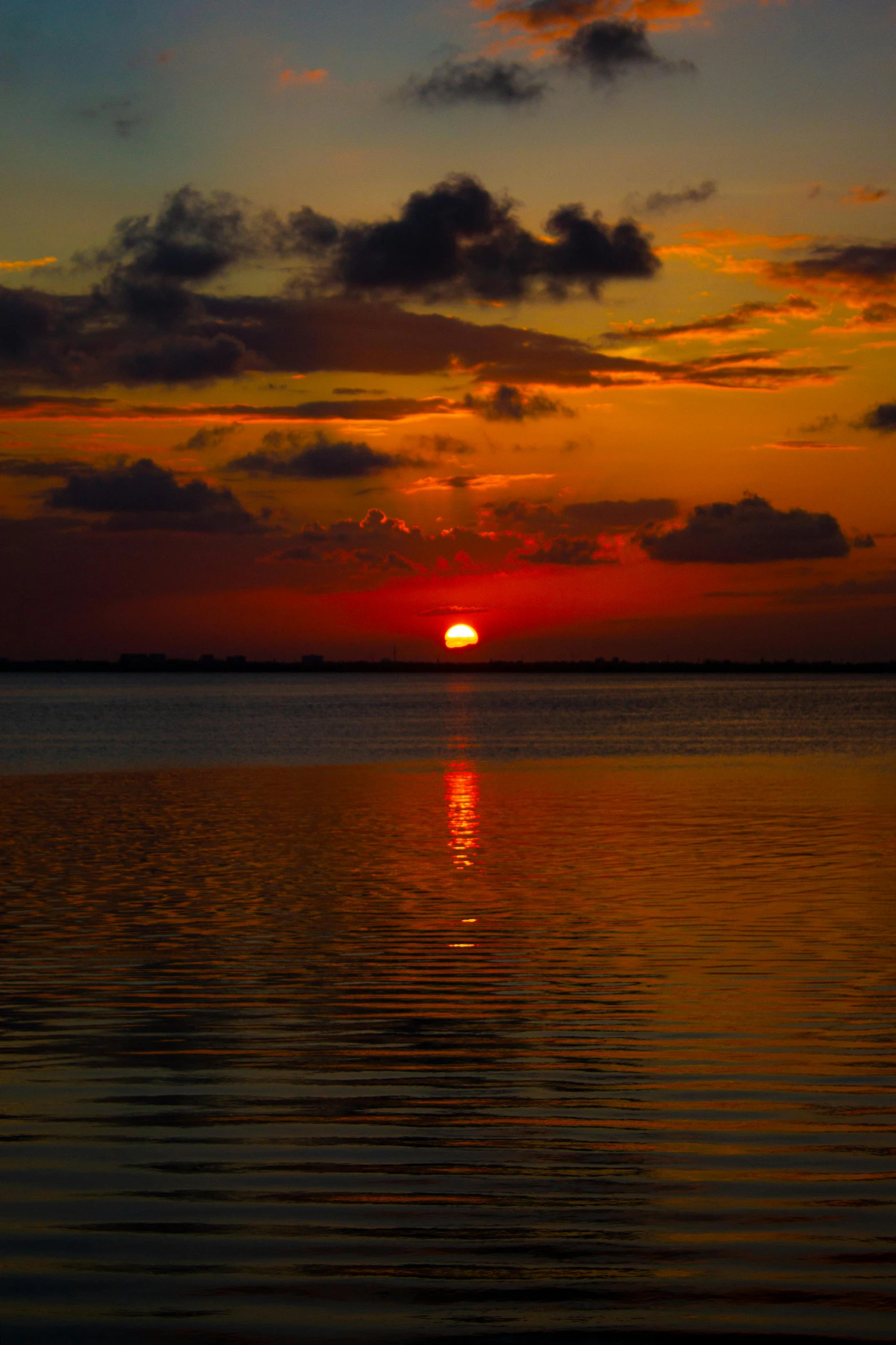 the sun is setting over a body of water, happening, florida, slide show, afar, f/2.5