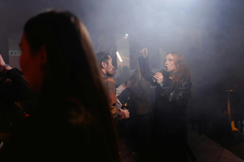 a group of people standing on top of a stage, an album cover, pexels, antipodeans, smoke filled room, ellie bamber, kramskoi 4 k, behind the scenes photo