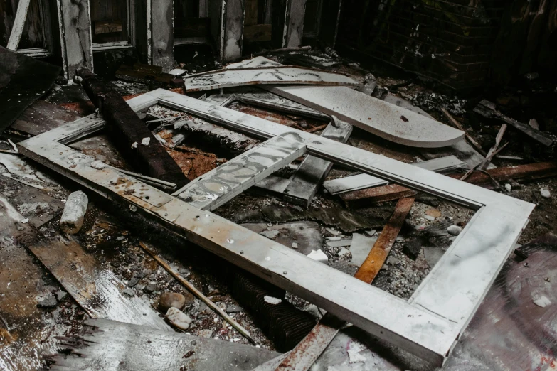 a room that has a lot of debris on the floor, pexels contest winner, rusted panels, housefire, background image, profile image