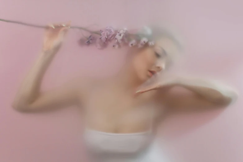 a woman with a flower crown on her head, an album cover, inspired by Anna Füssli, trending on pexels, aestheticism, flowing sakura-colored silk, slow - shutter, milk bath photography, woman is curved