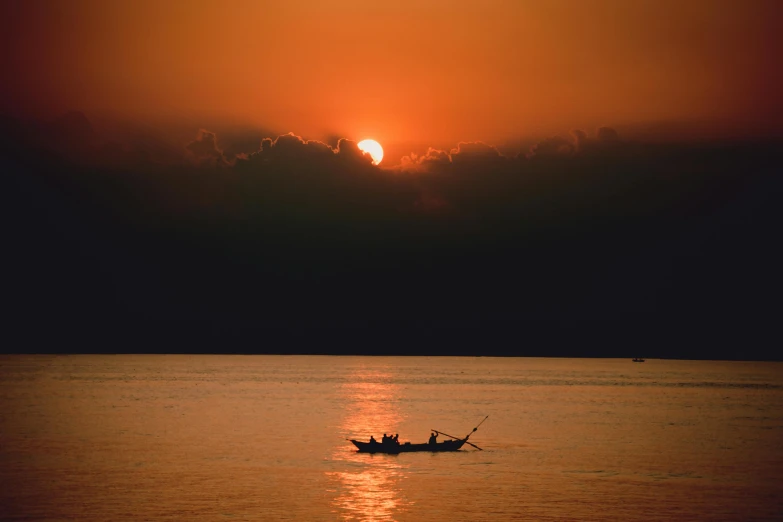 a boat in the middle of a large body of water, by Yasushi Sugiyama, pexels contest winner, romanticism, suns, vietnam, 2000s photo, fine art print