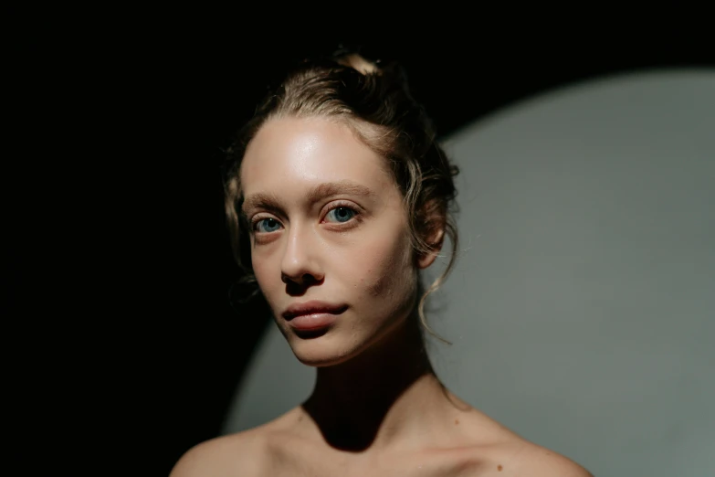 a woman posing for a picture in the dark, unsplash, hyperrealism, sydney sweeney, white skin and reflective eyes, afternoon sun, ignant