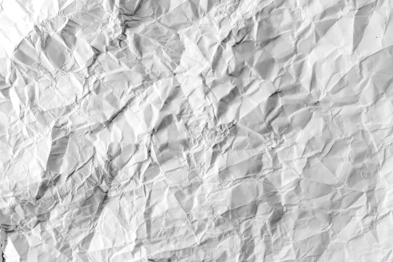 a black and white photo of a sheet of paper, pexels, process art, background image, normal map, high detail illustration, crushed