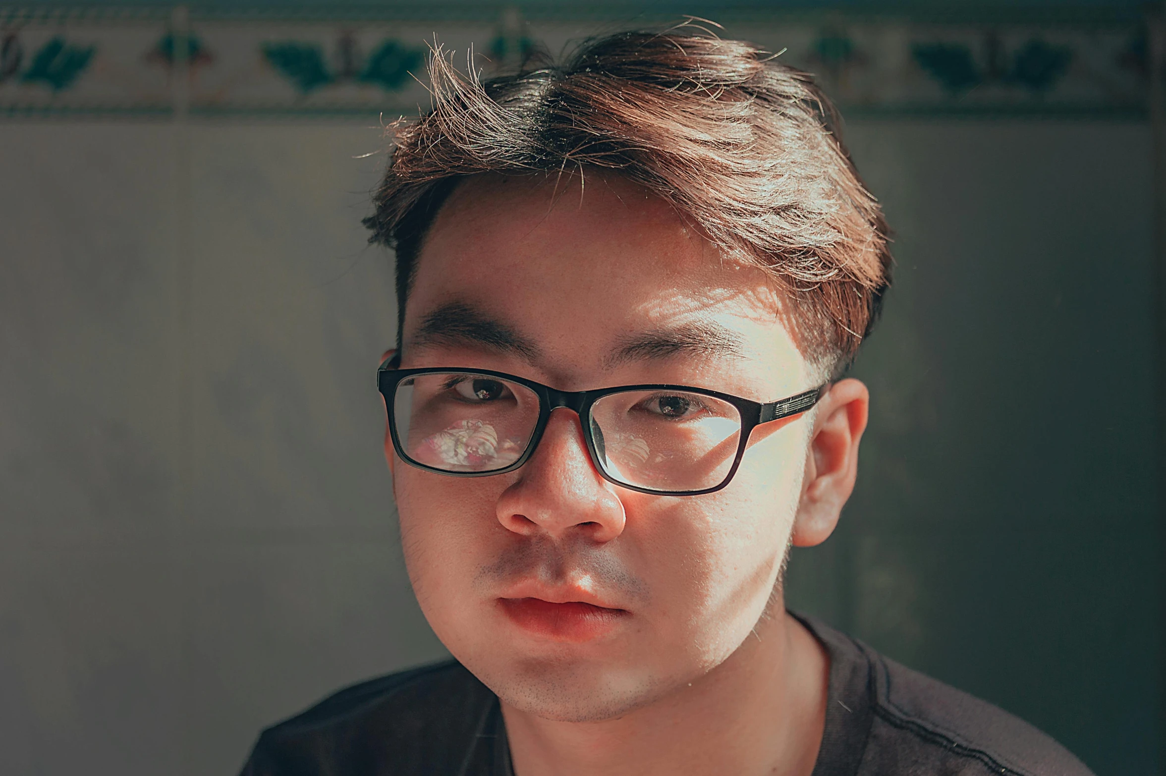 a close up of a person wearing glasses, a character portrait, inspired by Russell Dongjun Lu, pexels contest winner, clean shaven, discord profile picture, shot on sony a 7, medium shot portrait