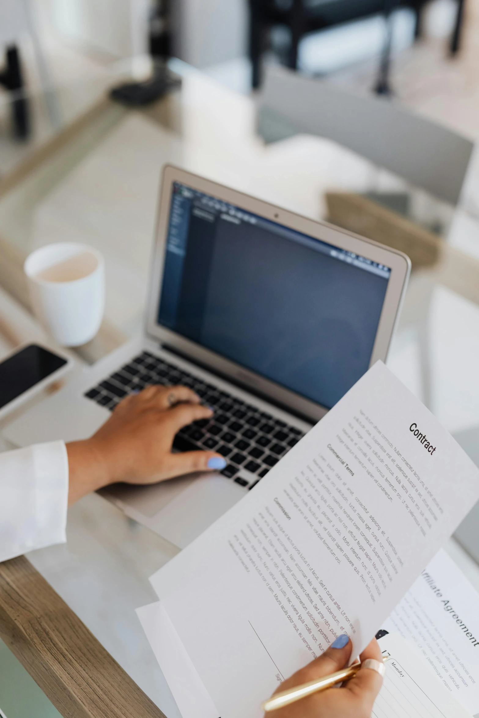 a woman sitting at a table working on a laptop, by Carey Morris, pexels contest winner, hypermodernism, lined paper, background image, high angle shot, selling insurance