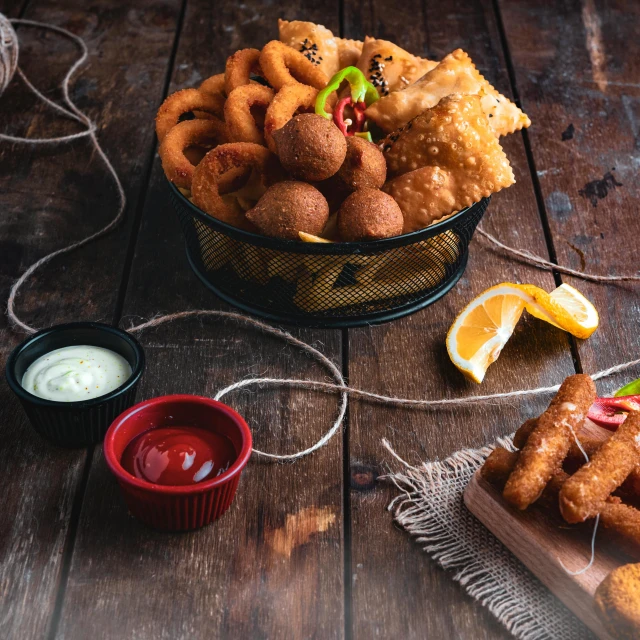 a basket of fried food sitting on top of a wooden table, inspired by Chippy, pexels contest winner, dau-al-set, square, plating, circle, professional product shot