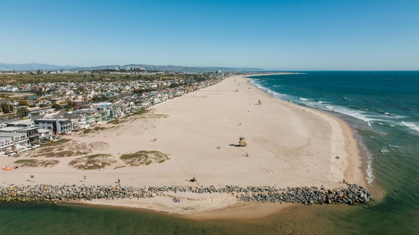 an aerial view of a beach next to the ocean, by Ryan Pancoast, santa monica beach, profile image, multiple stories, wide image