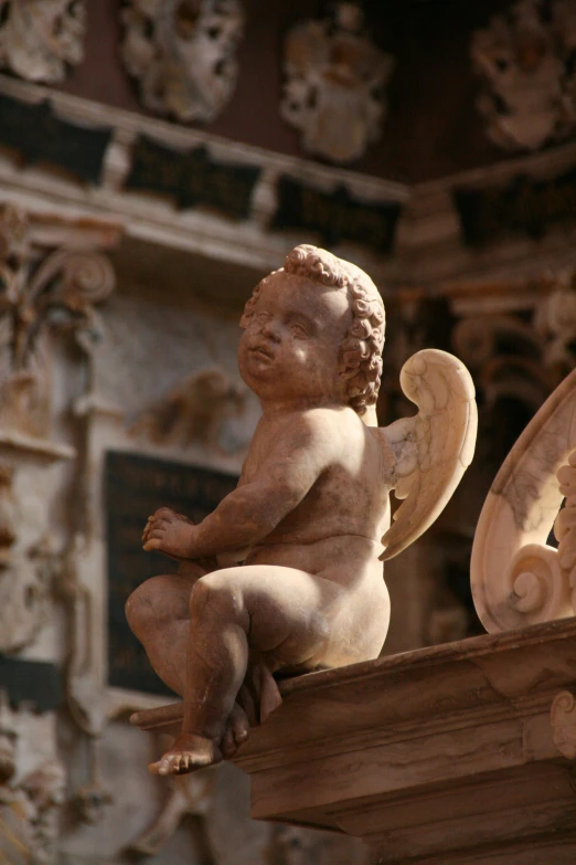 a statue of an angel sitting on top of a building, a statue, by Andrea del Verrocchio, baroque, bargello, putti, up close, charts
