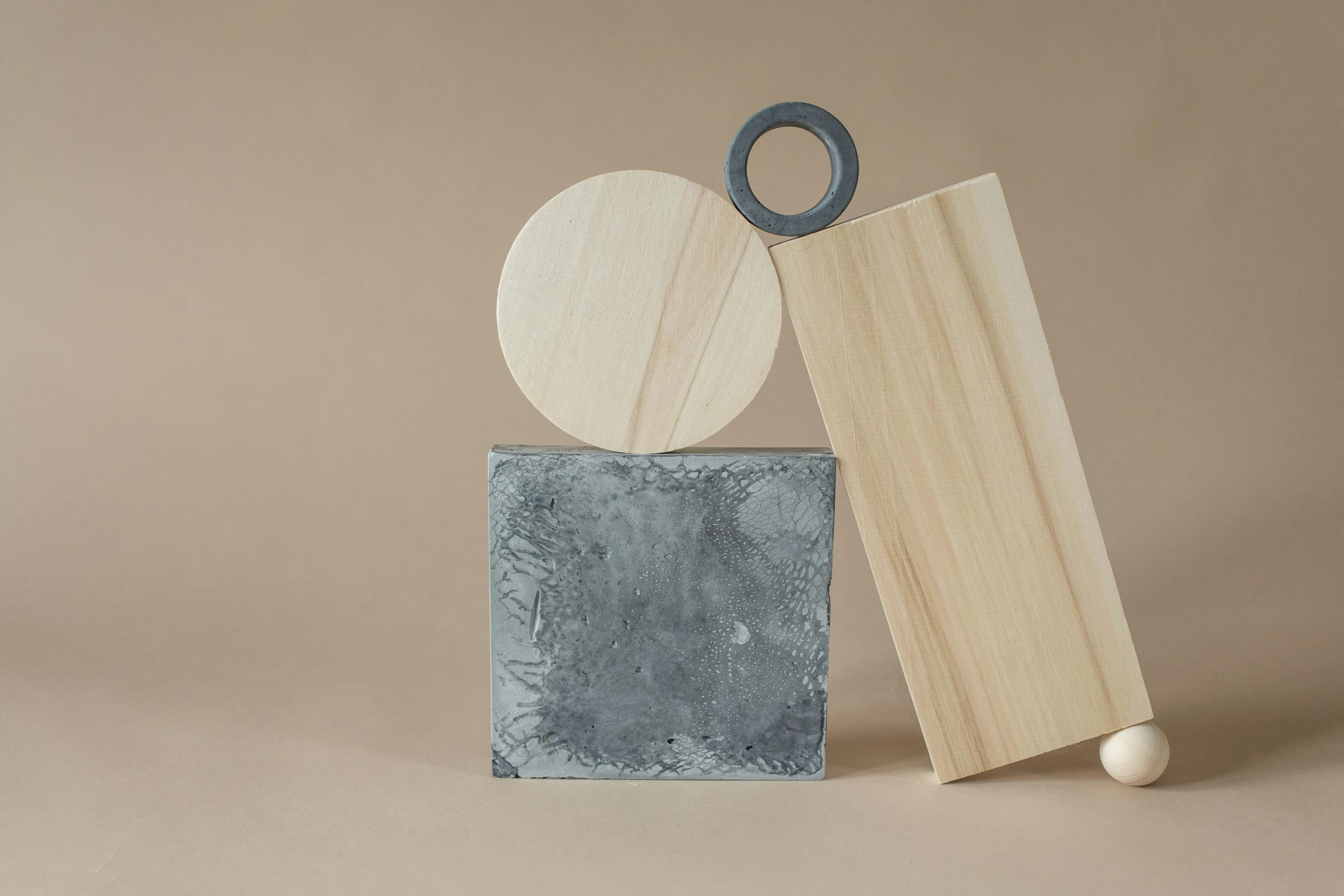 a couple of pieces of wood sitting next to each other, an abstract sculpture, instagram, concrete art, slate, circles, full product shot, with a square