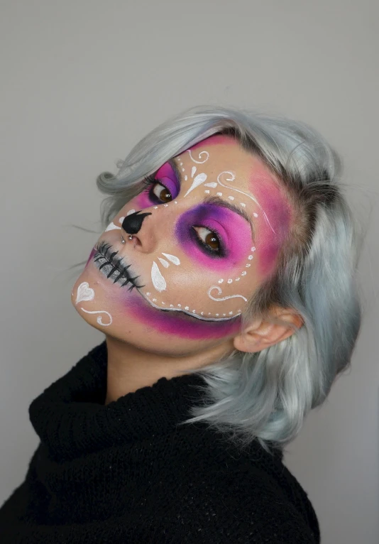 a woman with a skeleton make up on her face, inspired by Chica Macnab, reddit, lowbrow, profile image, square, magenta, ahegao face