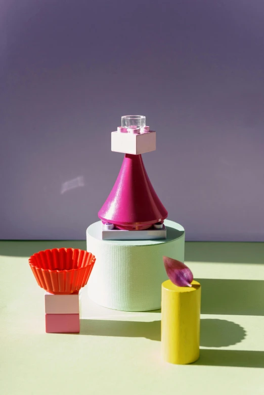 a couple of vases sitting on top of a table, an abstract sculpture, pop art, cupcake, light cone, magenta, full product shot