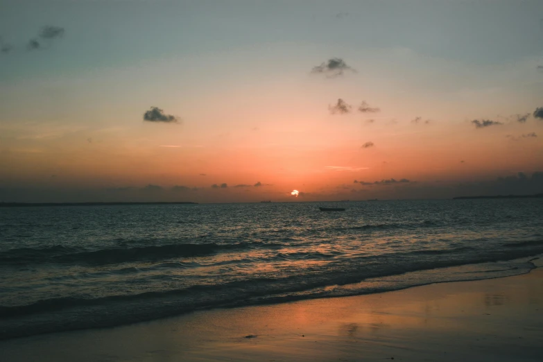 the sun is setting over the ocean on the beach, pexels contest winner, aruba, fades to the horizon, goodnight, high-quality photo