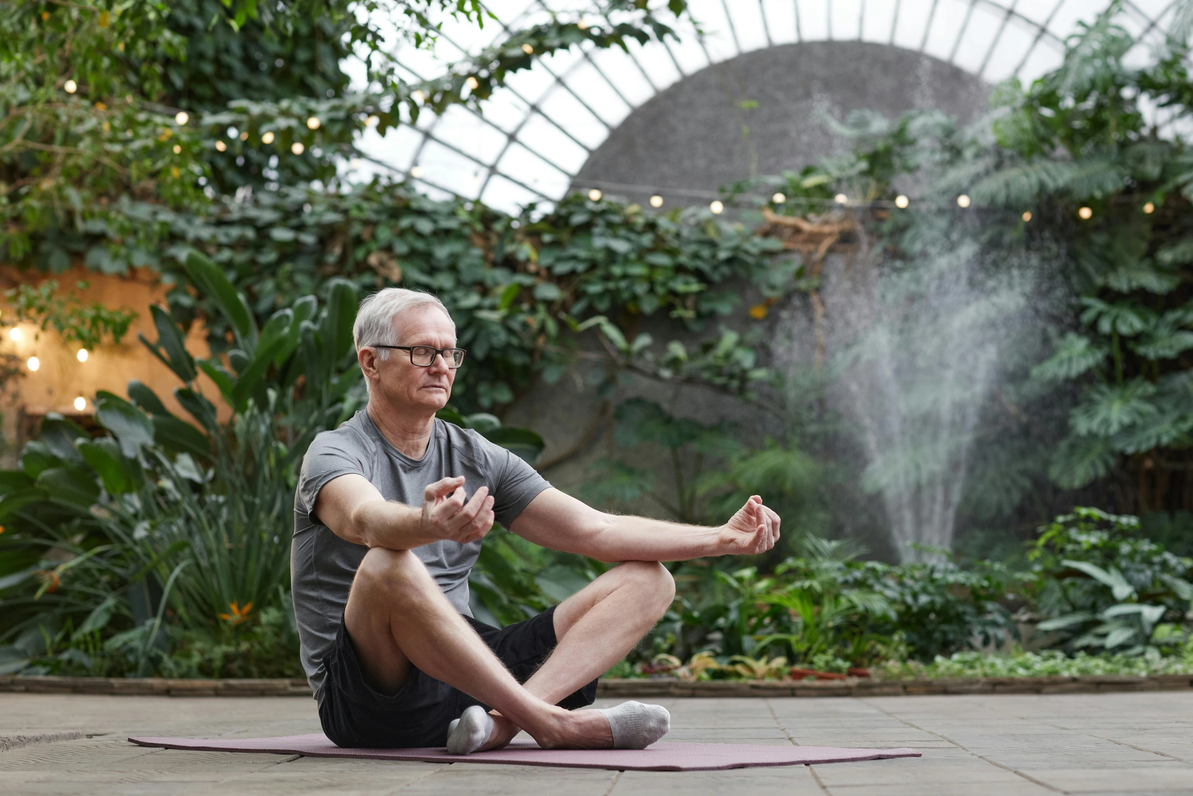 a man sitting on top of a pink yoga mat, a picture, unsplash, botanic garden, 5 5 yo, sitting on bent knees, avatar image