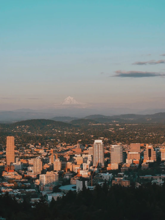 a view of a city with mountains in the background, a picture, by Meredith Dillman, unsplash contest winner, portland oregon, slide show, wide high angle view, mathematical