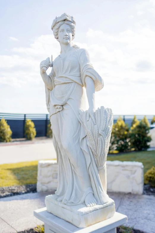 a statue of a woman holding an umbrella, celestial gardens, sweeping vista, exquisite marble details, tyler