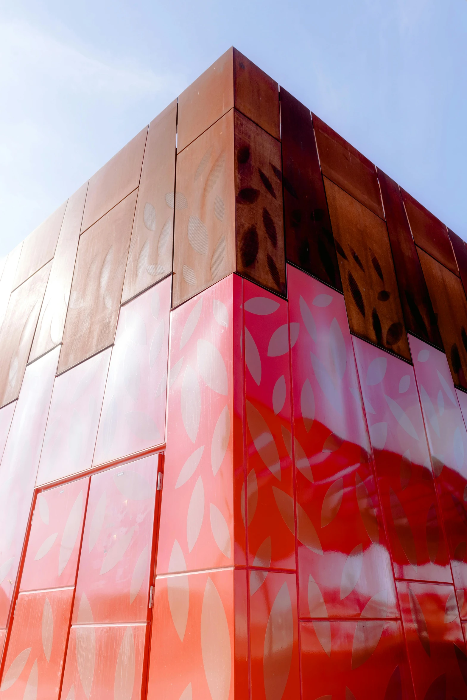 a close up of a building with a sky background, inspired by Yoshio Markino, interactive art, metallic red, pearlescent skin, square, copper