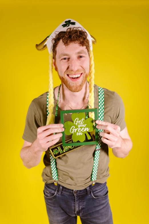 a man is wearing a st patrick's day hat, inspired by Bernd Fasching, asmongold, photo booth, its name is greeny, full product shot