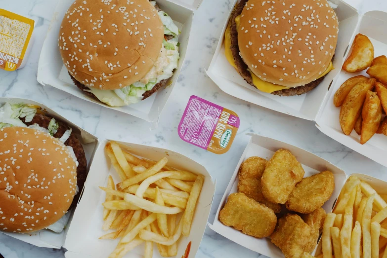 a table topped with lots of different types of food, trending on pexels, hyperrealism, big macs, 90s photo, 🦩🪐🐞👩🏻🦳, 6 pack