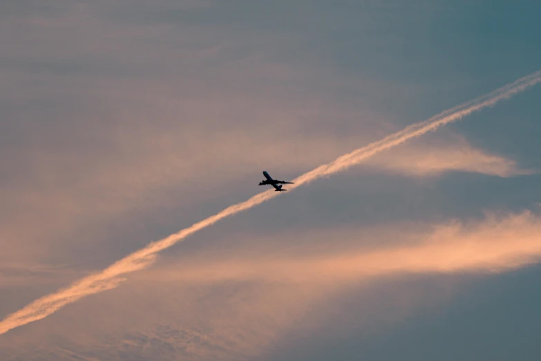 a plane that is flying in the sky, pexels contest winner, precisionism, early evening, profile image, sherbert sky, air force