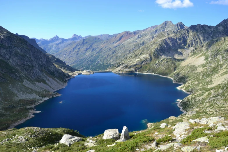 a large body of water surrounded by mountains, by Carlo Martini, pexels contest winner, hurufiyya, france, avatar image, maintenance photo