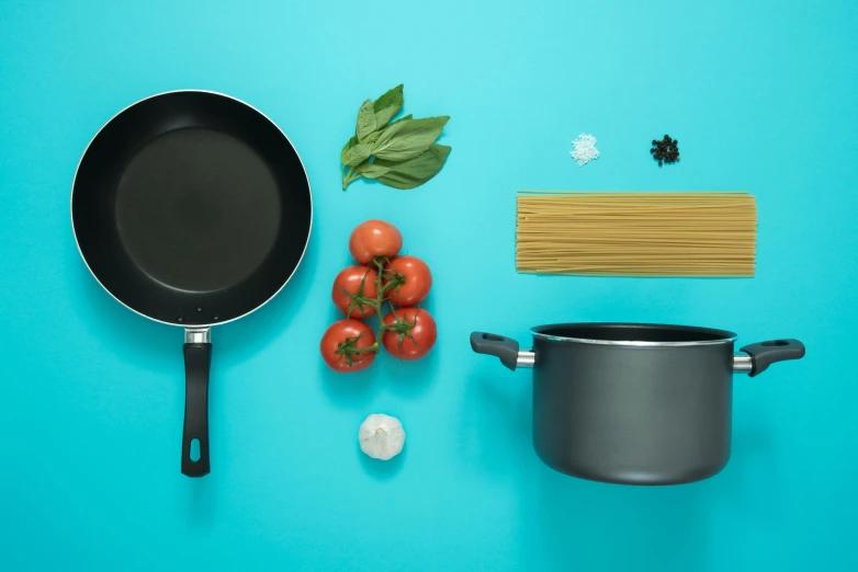 a pan, pasta, tomatoes, and basil on a blue background, pexels contest winner, minimalism, all black matte product, braziers, iridescent titanium, pots with plants