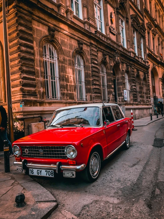 a red car parked on the side of a street, by Adam Rex, pexels contest winner, renaissance, lada car, square, front lit, italian