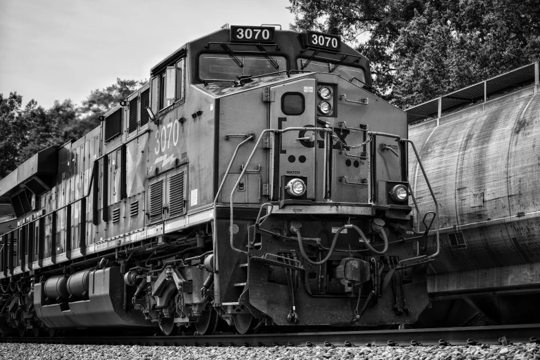 a black and white photo of a train, by Wayne England, unsplash, photorealism, highly detailed-h 704, cp2077, photography, young female