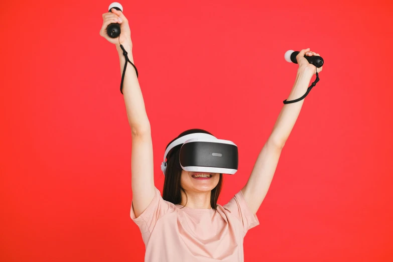 a woman wearing a virtual reality headset on a red background, pexels, hypermodernism, pose(arms up + happy), happy kid, vibrating, rey