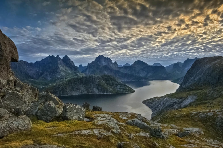 a large body of water surrounded by mountains, by Harald Giersing, pexels contest winner, romanticism, archipelago, hdr photo, youtube thumbnail, fan favorite