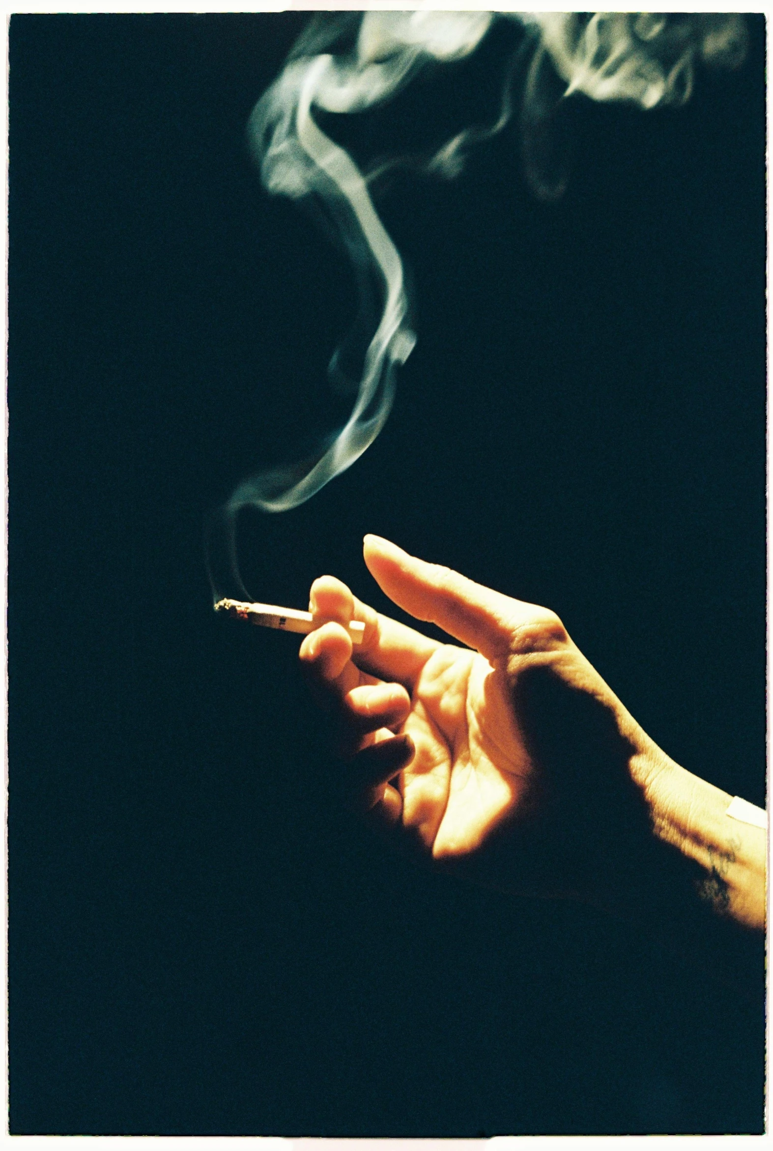 a hand holding a cigarette with smoke coming out of it, by Morgan Russell, taken in the late 2000s, ganja, ilustration, davide sorrenti