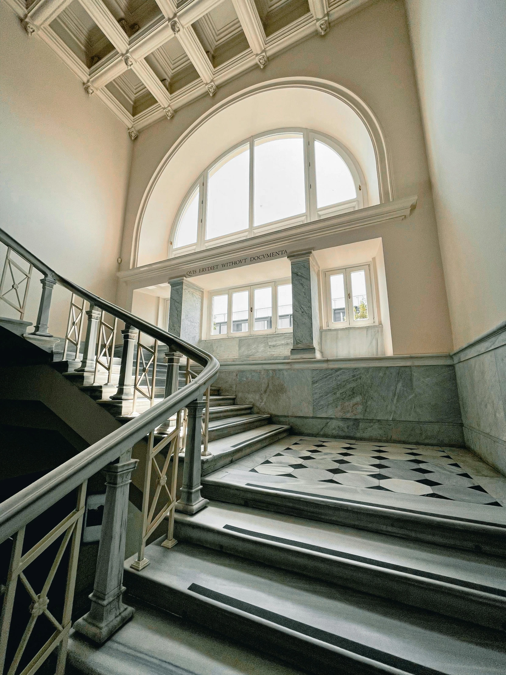 a staircase leading to a large window in a building, inspired by Jens Ferdinand Willumsen, unsplash contest winner, berlin secession, while marble, neoclassical police station, art nouveau ( 1 9 2 2 ), steel archways