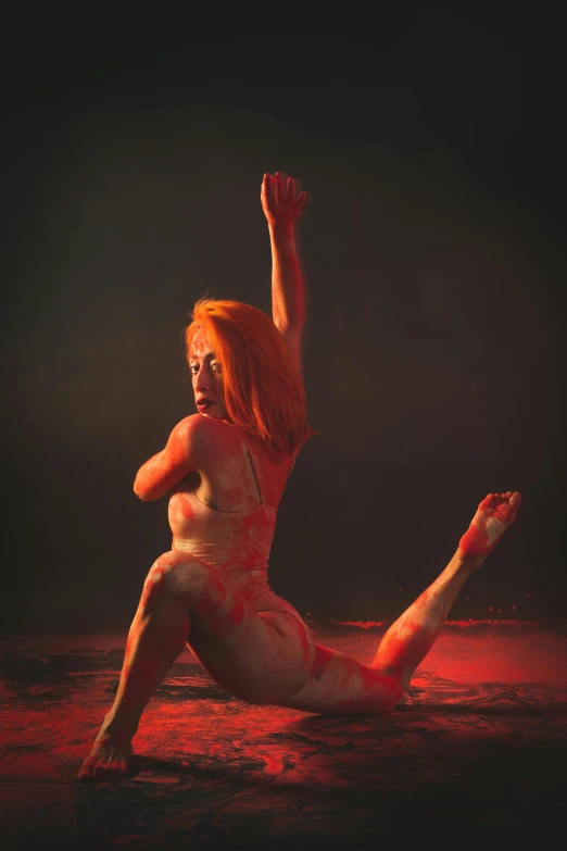 a naked woman with blood all over her body, an album cover, inspired by Elsa Bleda, conceptual art, better known as amouranth, playful pose of a dancer, orange glow, crawling