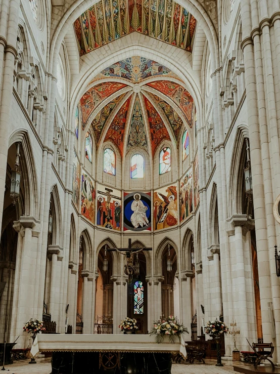 a view of the inside of a cathedral, a colorized photo, pexels contest winner, romanesque, madrid, gif, grey, panoramic