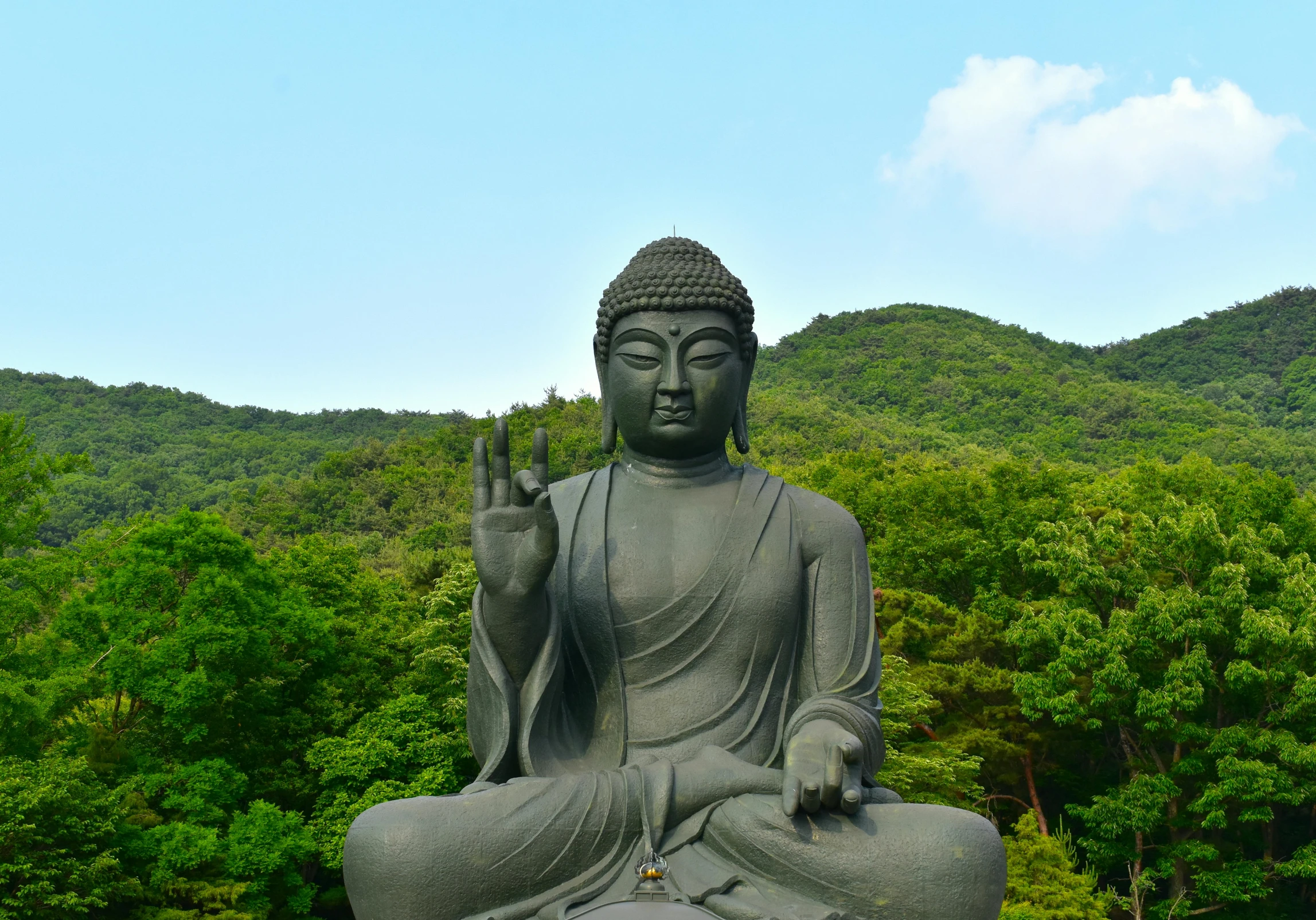 a statue of a person sitting on top of a rock, a statue, pexels contest winner, sōsaku hanga, a beautiful buddhist mandala, 🚿🗝📝, waving, korean