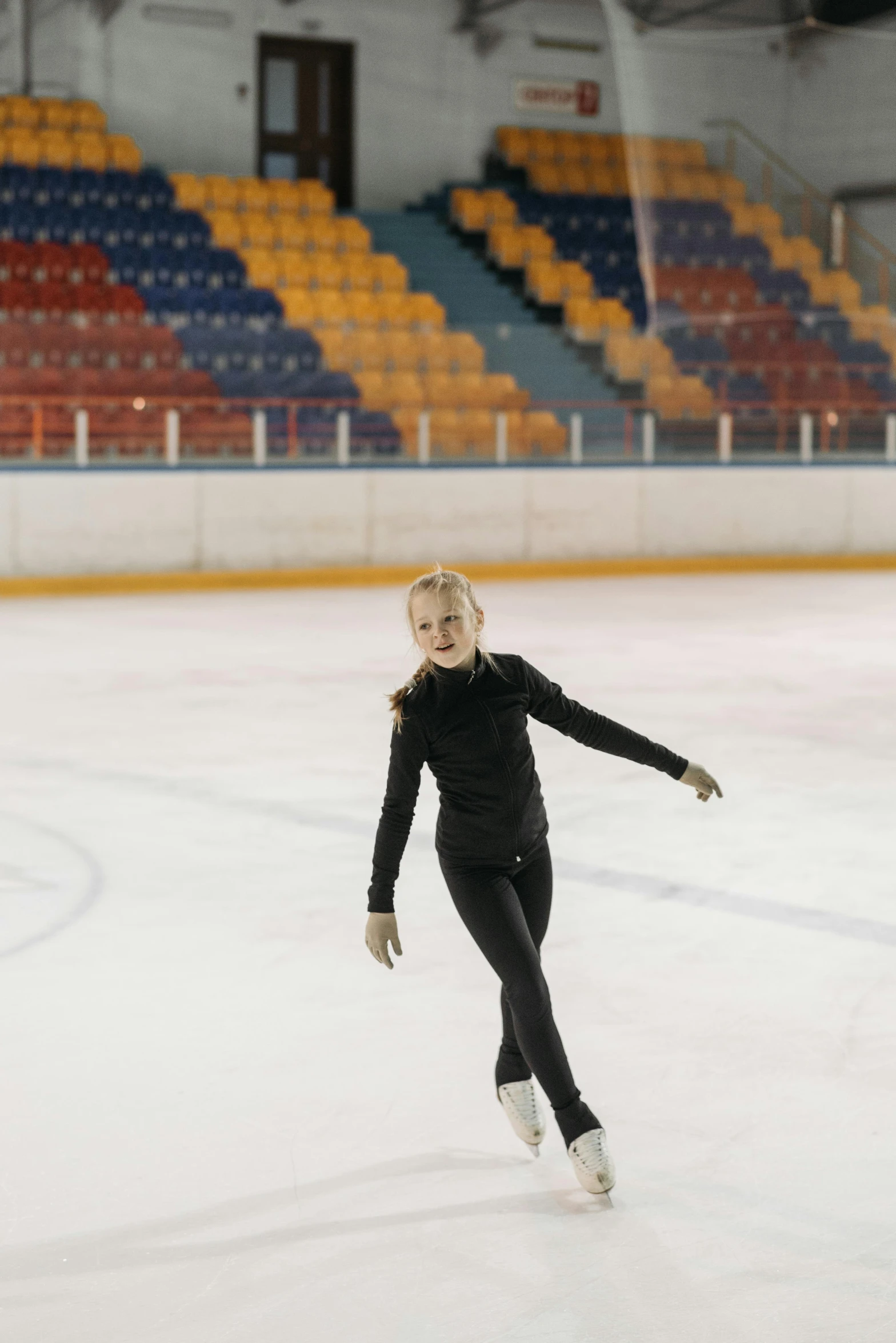 a female figure skating on an ice rink, a picture, pexels contest winner, arabesque, greta thunberg smiling, 15081959 21121991 01012000 4k, full frame image, 1 6 years old