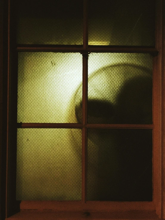 a shadow of a person behind a window, an album cover, unsplash, scp-173, ignant, late night melancholic photo, hollow eyes